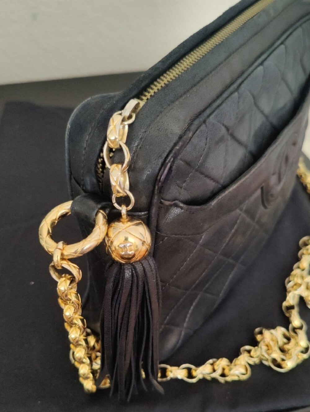 Authentic CHANEL Black Quilted Leather Shoulder Bag with Gold Chain and Tassel - Picture 11 of 12